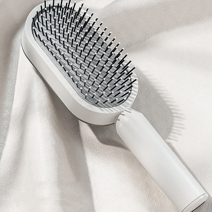 Cepillo para el cabello autolimpiante antiestático 